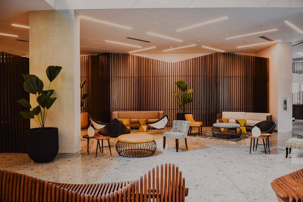 Lounge with armchairs and plants