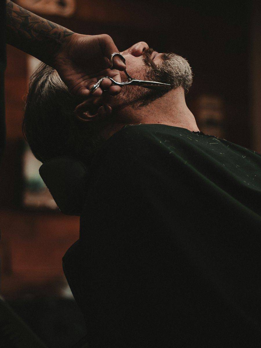 Barber giving a razor shave